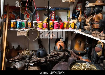 Arusha,Tanzania, Africa.02 february 2022. African masks, beaded bracelets, necklaces, Tanzanian bags woven from natural material displayed for sale at Stock Photo