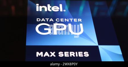 Viersen, Germany - March 9. 2024: Closeup of smartphone on computer keyboard with logo lettering of Intel Data center GPU Stock Photo