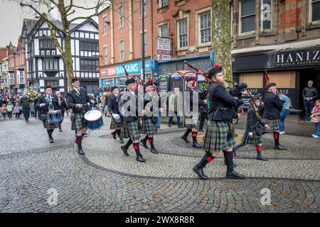 Warrington St Patrick's Day parade 2024 walks along Bridge Street in the town centre Stock Photo