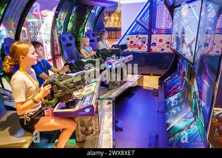 Miami Florida,PortMiami Port of Miami,onboard inside interior,Norwegian Joy Cruise Line ship,7-day Caribbean,Video Arcade games,teen teenage teenager, Stock Photo