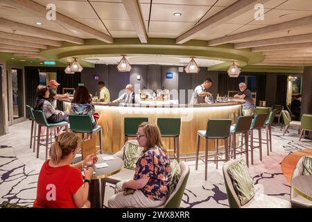 Miami Florida,PortMiami Port of Miami,onboard inside interior,Norwegian Joy Cruise Line ship,7-day Caribbean,Sugarcane Mojito Bar,night nightlife,man Stock Photo