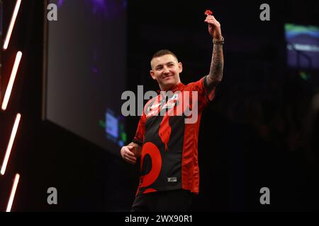 Luke Littler celebrates winning a leg during the BetMGM Premier League ...