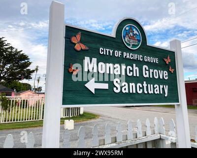 Sign for the Monarch Grove Sanctuary in the City of Pacific Grove, California, United States. Monarch butterflies migrate to Pacific Grove in winter. Stock Photo