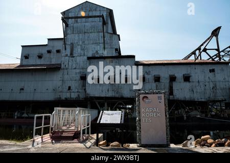 The last abandoned tin mining dredger during British colonial now display in Tanjung Tualang, Batu Gajah, Perak, Malaysia - Malayan Tin Dredging (MTD) Stock Photo