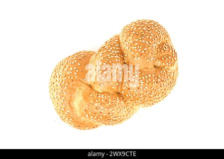 Golden braided sesame bread isolated on white background Stock Photo
