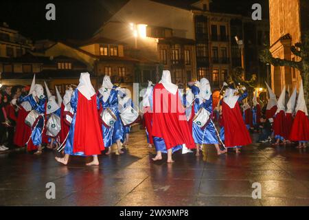 March 28, 2024, AviléS, Asturias, Spain: Avilés, Spain, March 28, 2024: The music band of the Brotherhood of San Juan Evangelista playing during the Procession of Silence, on March 28, 2024, in Avilés, Spain. (Credit Image: © Alberto Brevers/Pacific Press via ZUMA Press Wire) EDITORIAL USAGE ONLY! Not for Commercial USAGE! Stock Photo