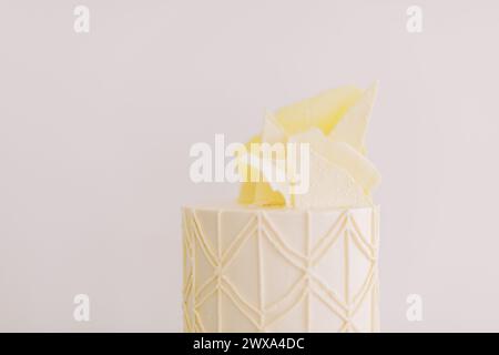 Chic vanilla cake with geometric sugar artistry Stock Photo