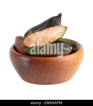 Fresh finger limes in wooden bowl isolated on white background. Caviar lime. Fruits pods Stock Photo