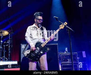 London, UK. 28th Mar 2024. Feeder performing live at Roundhouse, London on 28 March 2024 Taka Hirose ,bassist, backing vocals Feeder are a Welsh rock band formed in Newport, Wales. They have released eight studio albums, three compilations, two EPs, and 34 singles. Feeder's music has been inspired by a wide variety of artists and styles. The band was formed in '92 under the name of 'Reel'. This is their 'Black / Red' tour for the album of the same name - their twelfth album. Credit: Dafydd Owen/Alamy Live News Stock Photo