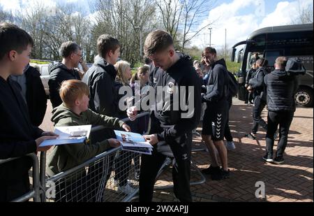 Coventry City's Josh Eccles signs autographs for fans before the Sky Bet Championship match at the John Smith's Stadium, Huddersfield. Picture date: Friday March 29, 2024. Stock Photo