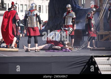 The passion of Jesus, a theatrical event portraying the last days of Jesus takes place in Trafalgar Square on Good Friday, part of the Easter weekend. credit: Roland Ravenhill/Alamy Stock Photo