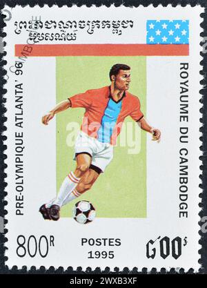 Cancelled postage stamp printed by Cambodia, that shows Football, promoting Summer Olympic Games 1996 - Atlanta, circa 1995. Stock Photo