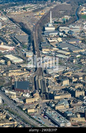An aerial view of the industrial town of Huddersfield, west Yorkshire, northern England, UK, showing the trans pennine railway line & station Stock Photo