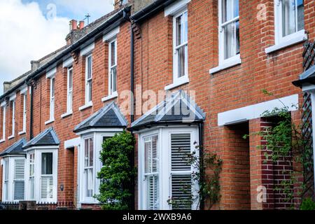 Leatherhead Surrey, UK, March 29 2024, Row Of Traditional Urban Terraced Houses With No People Stock Photo
