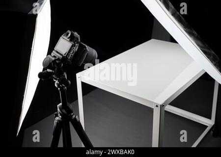 camera on tripod in studio Stock Photo