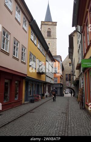 Cobblestone walkway on the Merchants' bridge, Krämerbrücke, medieval arch bridge lined with half-timbered shops and houses, Erfurt, Germany Stock Photo