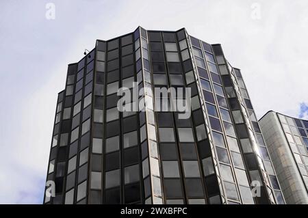 Boat trip on the L'ILL, Strasbourg, Alsace, Modern building with black facade and reflective windows, Strasbourg, Alsace, France Stock Photo