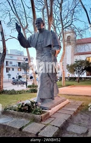 Statue of Pope John Paul II, in Largo da Assuncao, view in sunset shadows, Cascais, Portugal Stock Photo