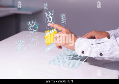 man with virtual reality computer searches and finds his files and important documents Stock Photo