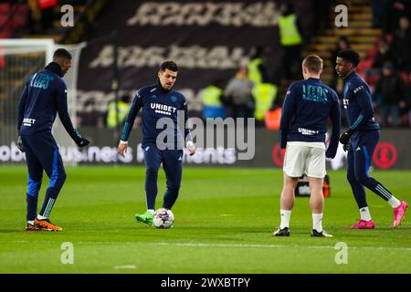 Leeds United's Joel Piroe (second left) warming up prior to kick off during the Watford FC v Leeds United FC sky bet EFL Championship match at Vicarage Road, Watford, England, United Kingdom on 29 March 2024 Credit: Every Second Media/Alamy Live News Stock Photo