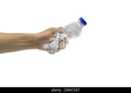 Man holding and crushing used plastic water bottle isolated on white background. Stock Photo