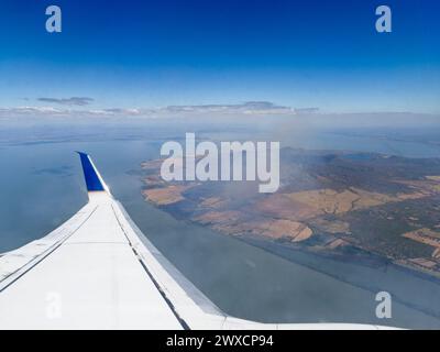 View from plane windows on flight approaching Managua, Nicaragua Stock Photo