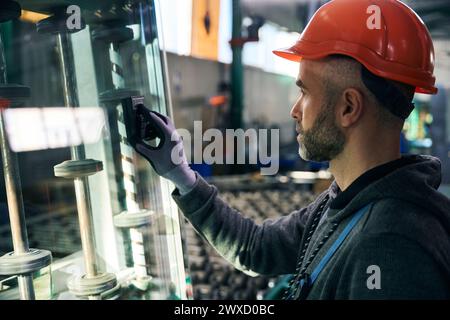 Master uses special tools for working with glass Stock Photo