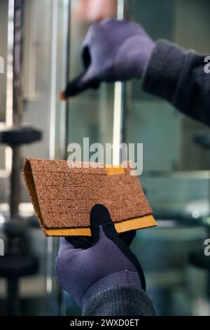 Man uses special inserts to transport double-glazed windows Stock Photo