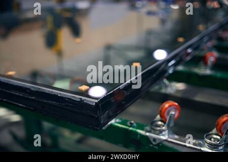 Formation of double-glazed windows in window production Stock Photo