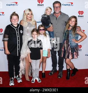(FILE) Tori Spelling Files for Divorce from Dean McDermott After 18 Years of Marriage. Spelling cites 'irreconcilable differences' for the divorce in her petition, filed on Friday, March 29, 2024 in Los Angeles Superior Court. LAS VEGAS, NEVADA, USA - SEPTEMBER 20: American actress and author Tori Spelling, husband/Canadian actor Dean McDermott and children Stella Doreen McDermott, Liam McDermott, Beau Dean McDermott, Hattie McDermott and Finn McDermott arrive at the 2019 iHeartRadio Music Festival - Night 1 held at T-Mobile Arena on September 20, 2019 in Las Vegas, Nevada, United States. (Pho Stock Photo