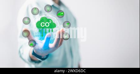 Reduce CO2 emission concept in hand for environmental, global warming ...