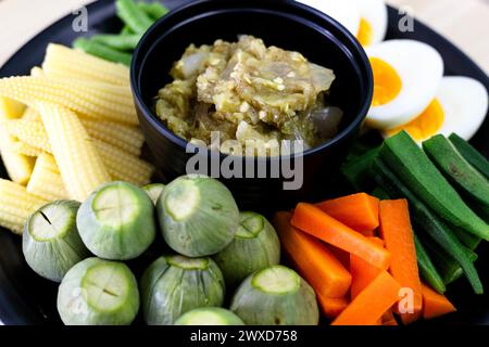 Chili paste made from fish and boiled vegetables. Authentic Traditional Thai food. Stock Photo