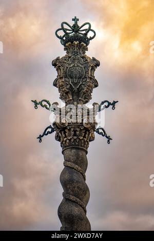 Detail of the ornate column carving of the pillory or pelourinho stone monument in the square in front of the Terreiro da Se Cathedral, Porto, Portuga Stock Photo