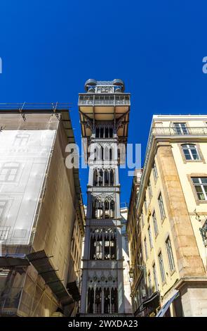 Frontal view from below of the Santa Justa Elevator or Elevador do Carmo. Modernist style metal structure elevator in the center of Lisbon. Portugal.T Stock Photo