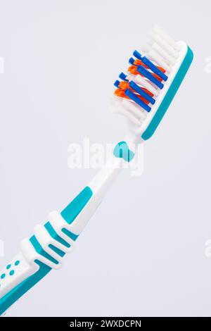 Colored toothbrushes. Isolated on white background. Stock Photo