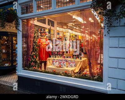 Shop window with colourful displays of tourist souvenirs and gifts in Castle Hill, Windsor, Berkshire, UK Stock Photo