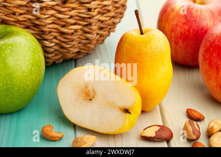 sliced yellow pear on wood background Stock Photo