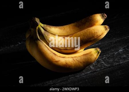 banana bunch on black background Stock Photo