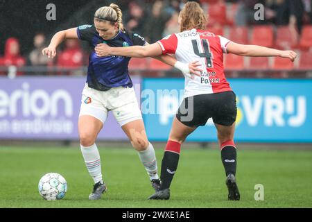 Rotterdam, Netherlands. 30th Mar, 2024. ROTTERDAM, 30-03-2024, Varkenoord, Azerion Eredivisie vrouwen, Feyenoord - Telstar (women), season 2023/2024, during the match Feyenoord - Telstar (women), Telstar player Caroliena Wolters, Feyenoord player Amber Verspaget Credit: Pro Shots/Alamy Live News Stock Photo