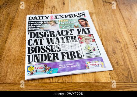 29 March 2024 Daily Express headline reads 'Disgrace!' Fat Cat Water Bosses Under Fire. Stock Photo