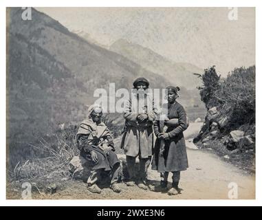Antique photograph. Group portrait of three residents from Ladakh or Spiti in Kullu, Himachal Pradesh, India. Original title: 'Natives of Ladock' Likely photographed by Frank Mason Good. Published by Francis Frith & Co. Himachal Pradesh, India. 1869 - 1875 Stock Photo
