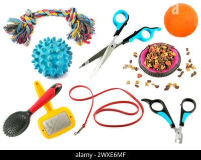 A set of toys, grooming items and other accessories for caring for animals isolated on a white background. Collage. Stock Photo