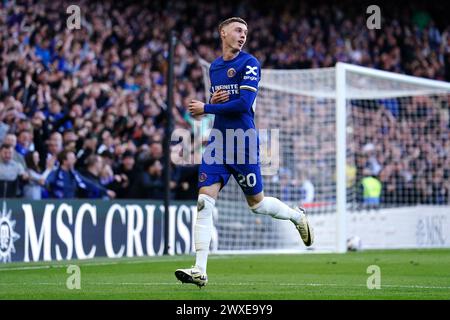 Chelsea's Cole Palmer celebrates scoring their side's second goal of the game during the Premier League match at Stamford Bridge, London. Picture date: Saturday March 30, 2024. Stock Photo