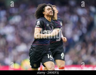 LONDON, ENGLAND - MARCH 30: Tahith Chong of Luton Town celebrating his goal to make it 0-1 during the Premier League match between Tottenham Hotspur and Luton Town at Tottenham Hotspur Stadium on March 30, 2024 in London, England.(Photo by Dylan Hepworth/MB Media) Stock Photo