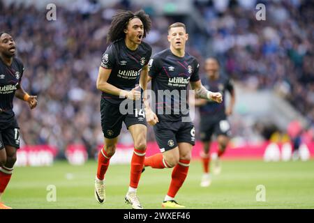 LONDON, ENGLAND - MARCH 30: Tahith Chong of Luton Town celebrating his goal to make it 0-1 during the Premier League match between Tottenham Hotspur and Luton Town at Tottenham Hotspur Stadium on March 30, 2024 in London, England.(Photo by Dylan Hepworth/MB Media) Stock Photo