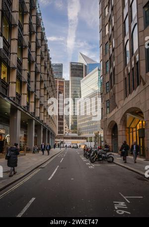 London, UK: Tall buildings in the City of London seen from Mincing Lane including the Cheesegrater, Willis Building, Scalpel and 120 Fenchurch Street. Stock Photo