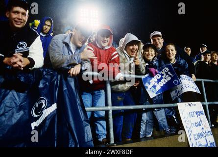 Student fans brave the rain, Pennsylvania State University vs. University of Pittsburg, traditional football rivalry, Beaver Stadium, State College, P Stock Photo