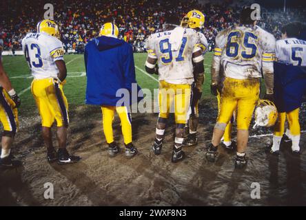 Muddy players on sideline, Pennsylvania State University vs. University of Pittsburg, traditional football rivalry, Beaver Stadium, State College, Pen Stock Photo