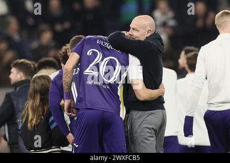 Brussels, Belgium. 30th Mar, 2024. Anderlecht's Luis Vazquez and Anderlecht's head coach Brian Riemer celebrate after winning a soccer match between RSC Anderlecht and Royal Antwerp FC, Saturday 30 March 2024 in Brussels, on day 1 (out of 10) of the Champions' Play-offs of the 2023-2024 'Jupiler Pro League' first division of the Belgian championship. BELGA PHOTO BRUNO FAHY Credit: Belga News Agency/Alamy Live News Stock Photo