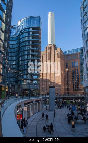 Battersea Power Station Chimneys and shopping arcade against a blue sky Stock Photo